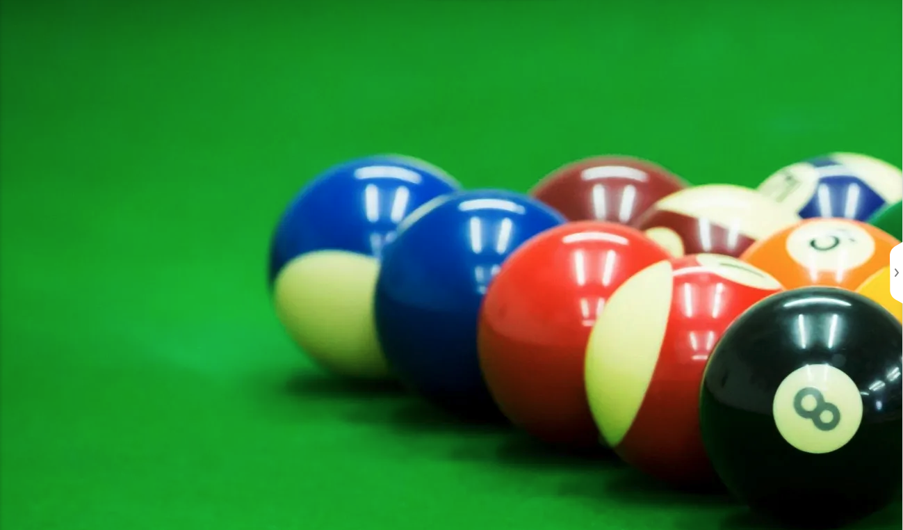 billiard balls on green felt